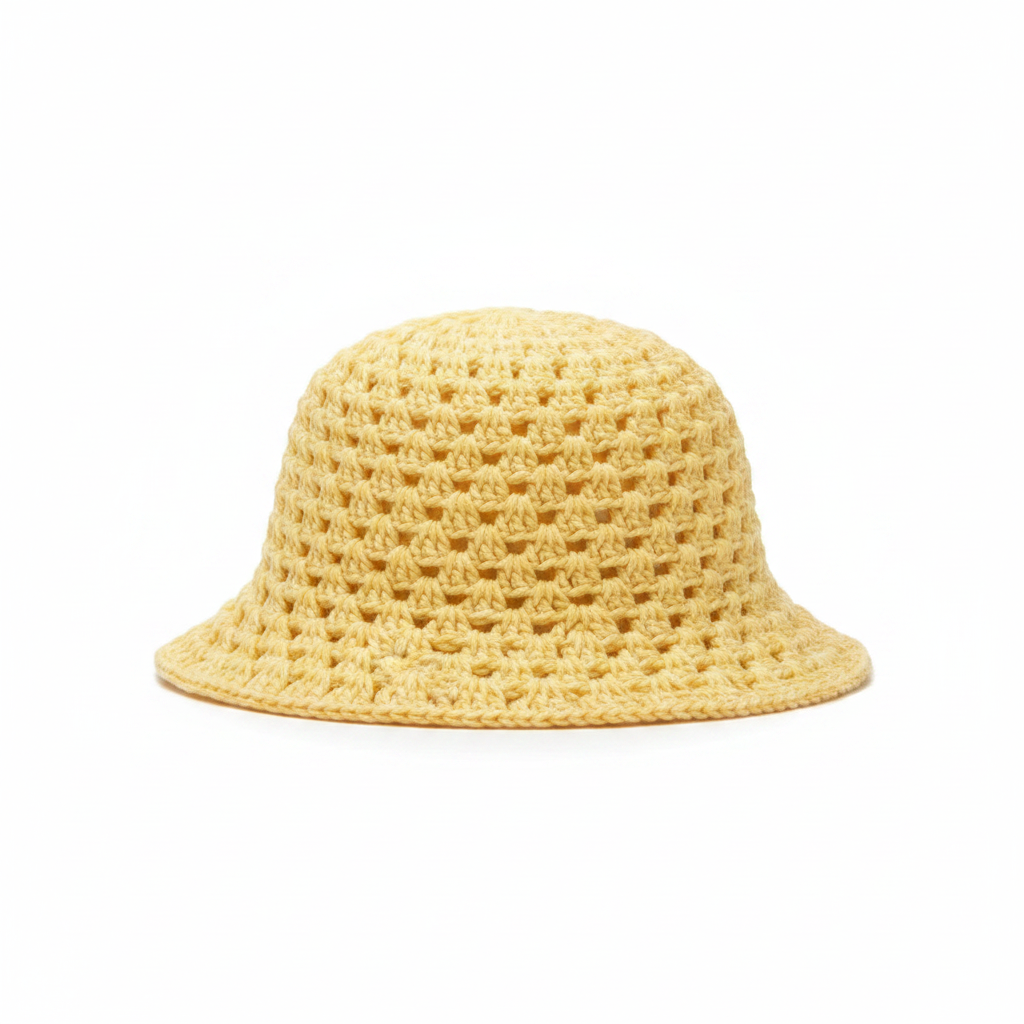 Yellow crochet bucket hat on white background