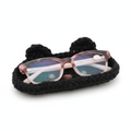 Handcrafted black crochet cat eyeglasses holder with pink tortoiseshell glasses on a clean white background